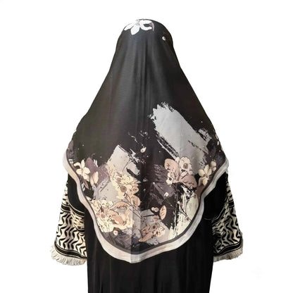 Back view of black floral instant hijab showing the draped panel with blush pink and ivory watercolor floral border