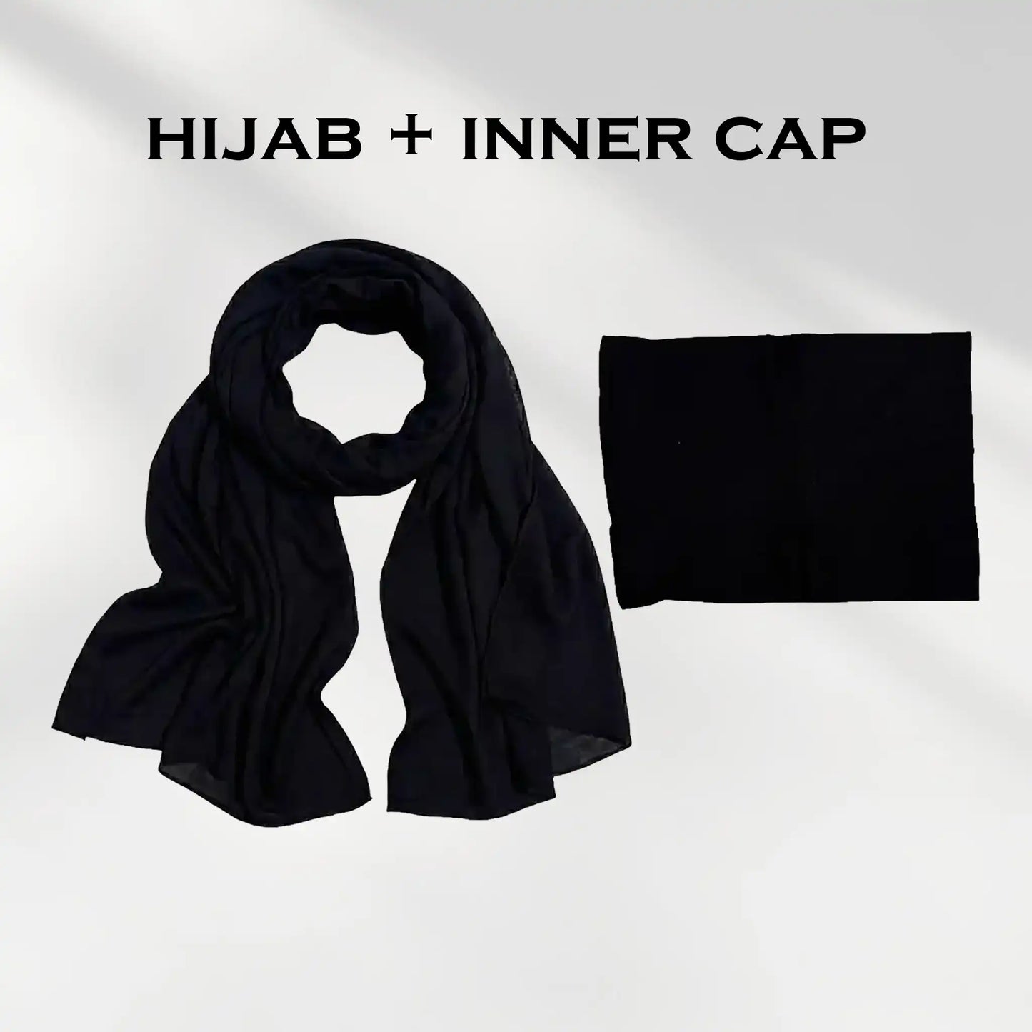 Black modal hijab and undercap set laid flat on a light background