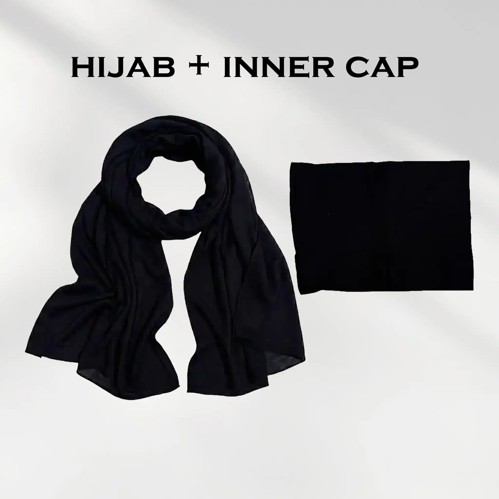 Black modal hijab and undercap set laid flat on a light background
