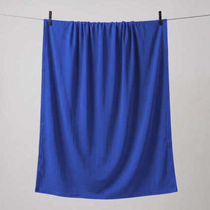 Full length royal blue jersey hijab hanging on a line