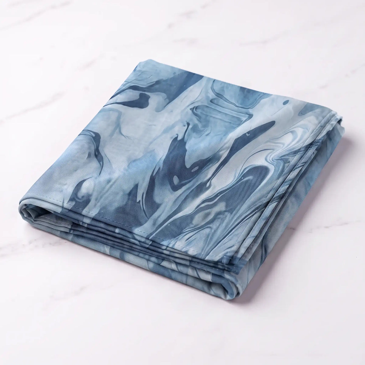 Folded blue printed modal hijab in blue and white
