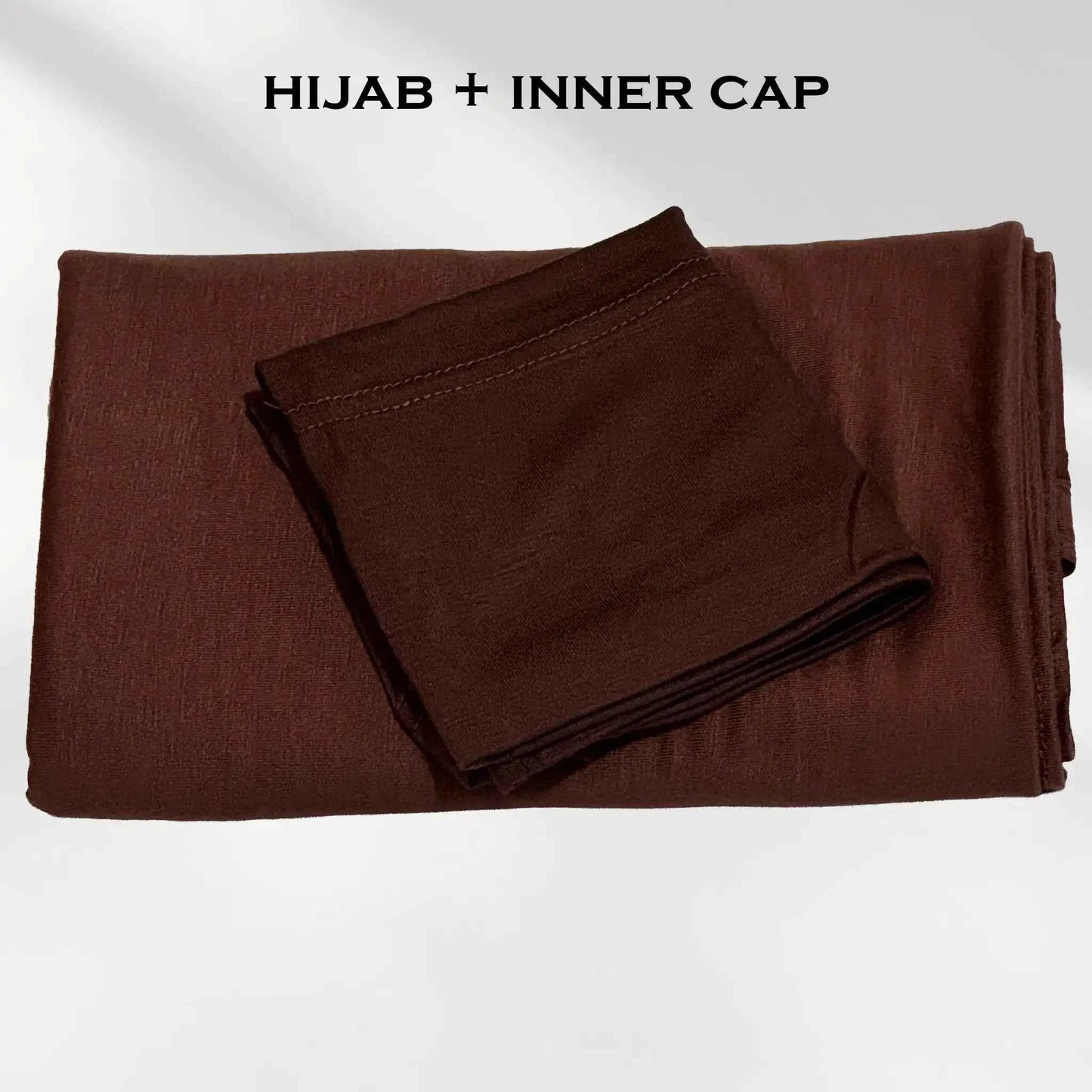Brown jersey hijab folded with its matching hijab cap, shown as a complete set