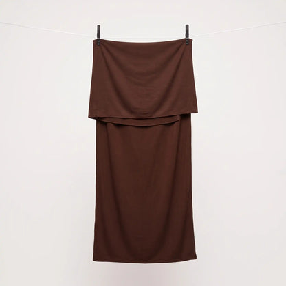 Full length brown jersey hijab hanging on a line