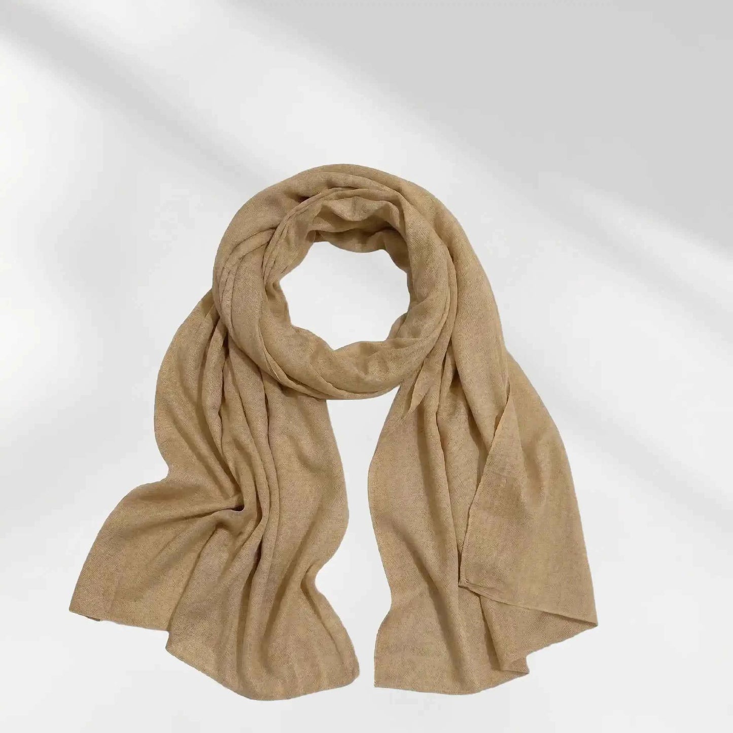 Brown modal hijab scarf draped to show its lightweight fall and soft weave 