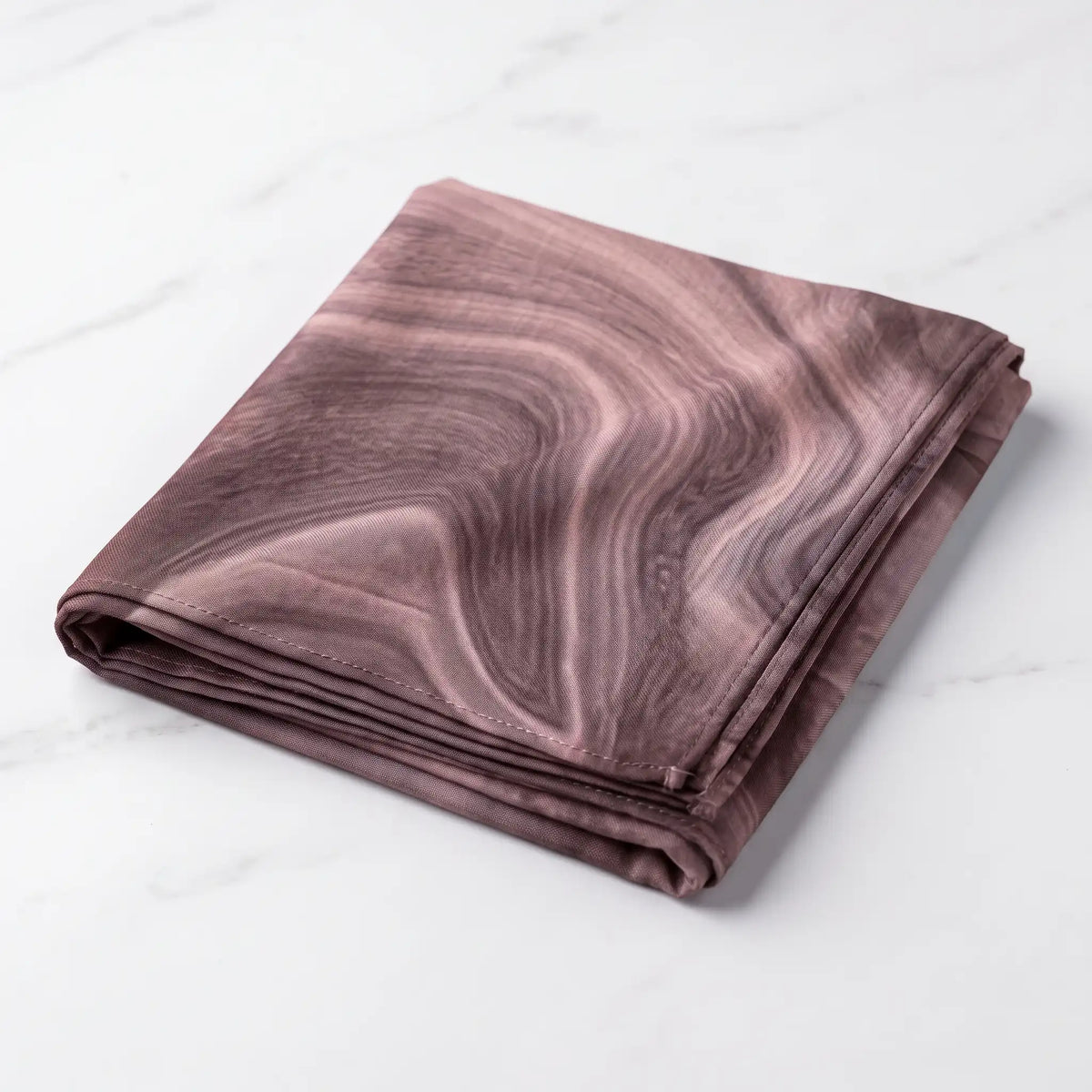Folded brown printed modal hijab in mocha and rose tones