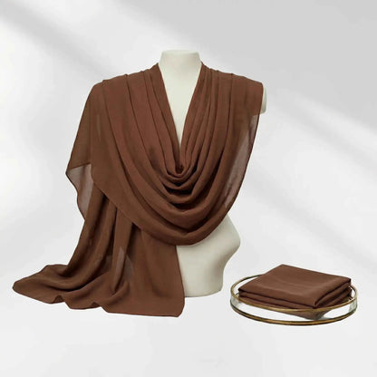 Chocolate brown chiffon hijab set styled on a mannequin with the folded hijab scarf beside it