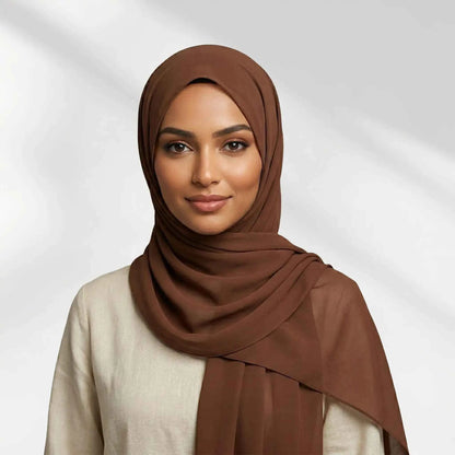 Woman wearing a chocolate brown chiffon hijab from the Wazi Empire chiffon hijab set
