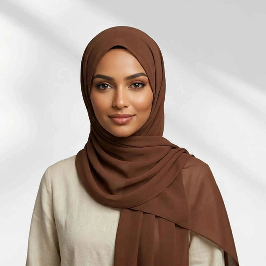 Woman wearing a chocolate brown chiffon hijab from the Wazi Empire chiffon hijab set