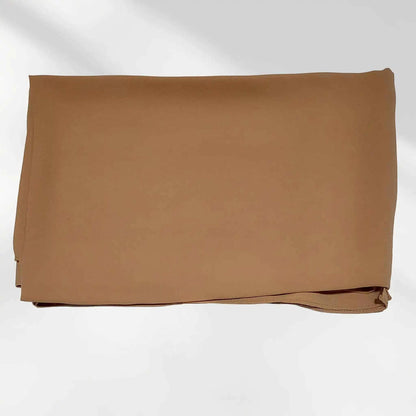 Folded brown chiffon hijab scarf laid flat displaying smooth fabric texture and stitched hem.