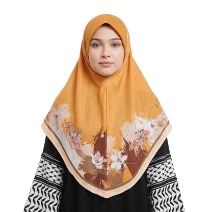 Woman wearing a golden floral hijab instant scarf with watercolor flower print border