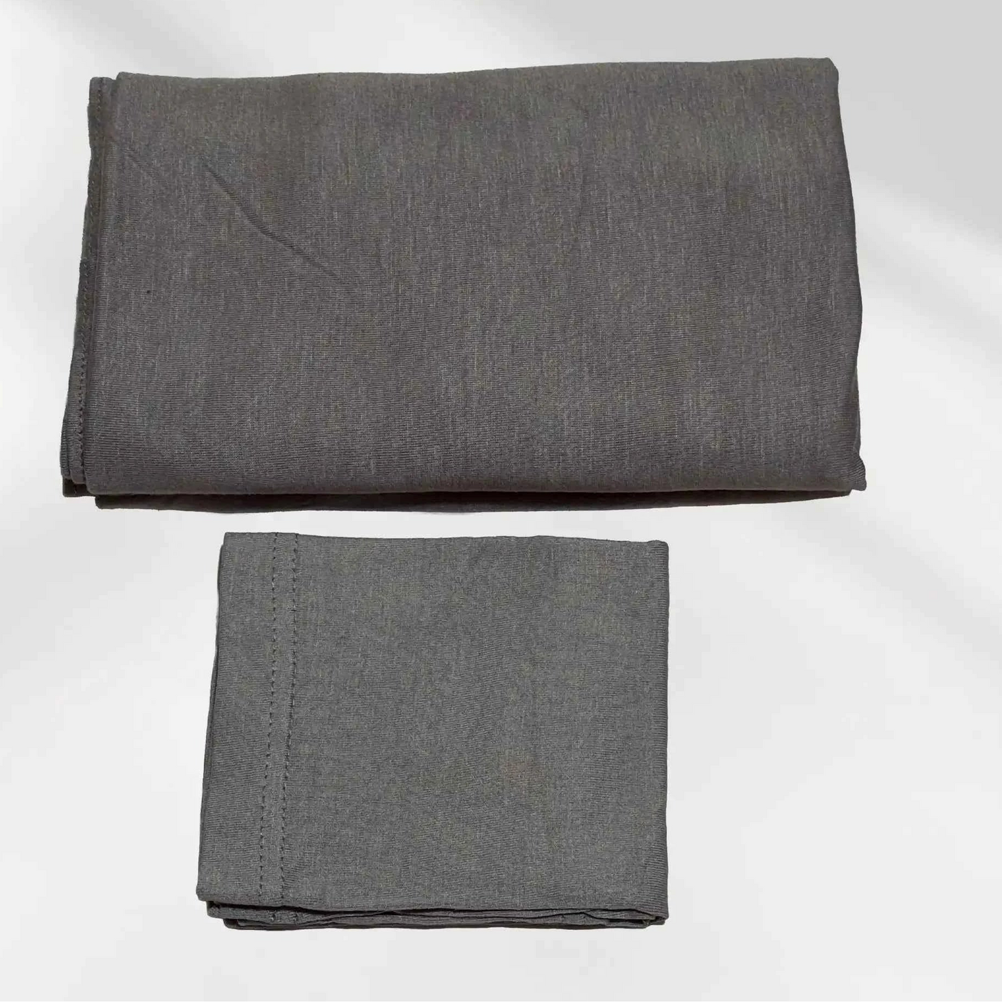 Gray jersey hijab shown with the separate matching hijab cap beside it