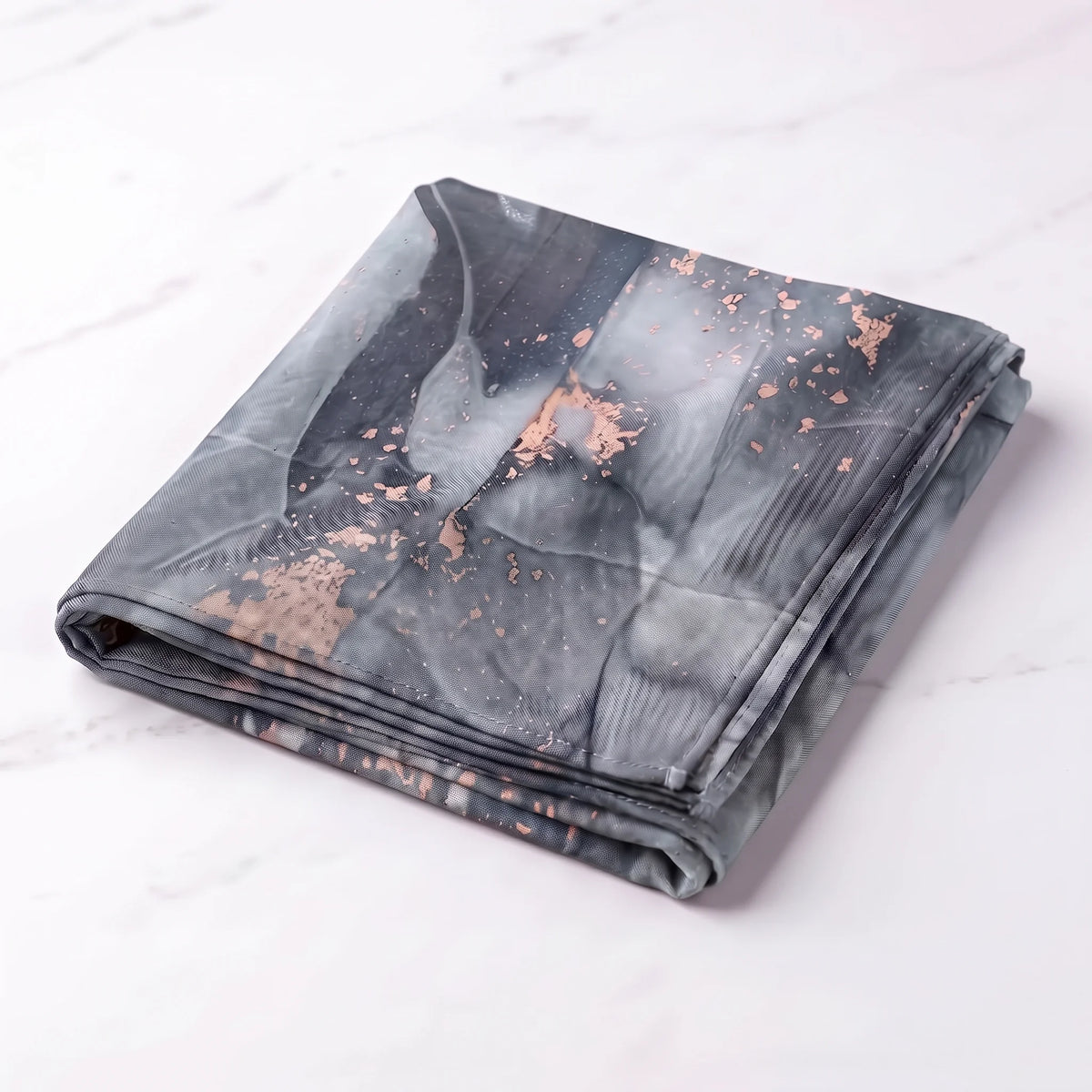 Folded grey printed modal hijab in charcoal and pale grey with rose gold flecks