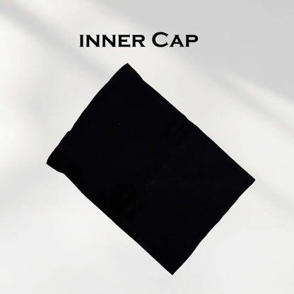 Black hijab undercap folded flat on a light background