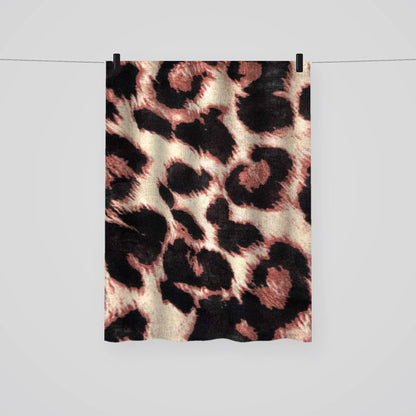 Full length leopard print hijab hanging on a line