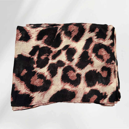 Folded leopard print modal hijab showing the brown and black spot pattern