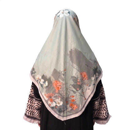 Back view of sage green floral printed instant hijab by Wazi Empire with watercolor flower details