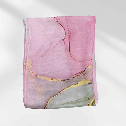 Folded watercolor printed modal hijab showing the soft pink pastel pattern