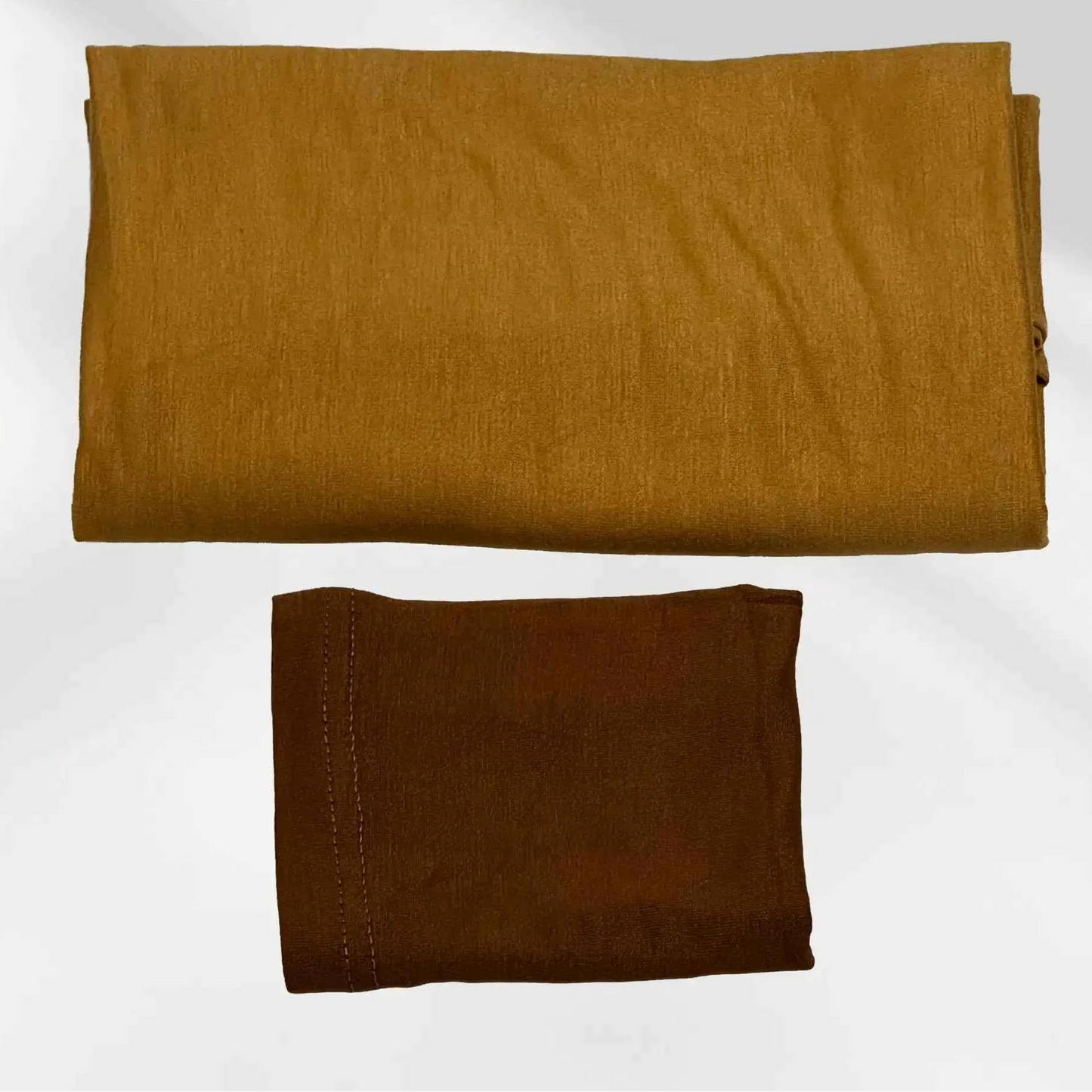 Yellow jersey hijab shown with the separate brown hijab cap beside it
